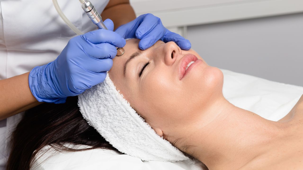 woman getting facial microdermabrasion